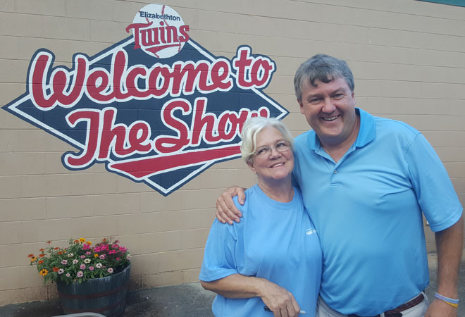 Jim Johnson and a Fans for the Cure volunteer