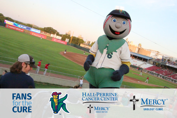 Mr Shucks atop the dugout at a Cedar Rapids Kernels game