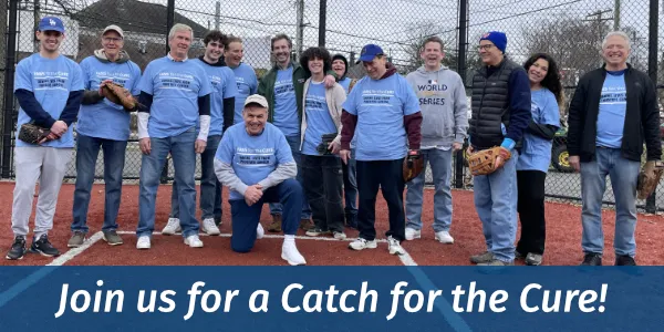 Ed Randall and a group of men and women having a catch on Super Bowl Sunday