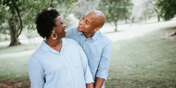 A man and a woman together in a park