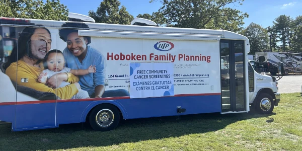 A medical testing van offering free community cancer screenings.