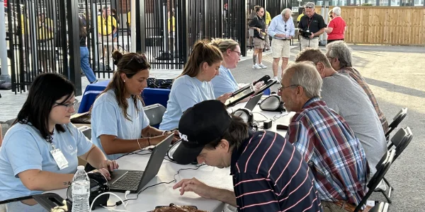 Men being registered for PSA screenings at the Richmond Flying Squirrels