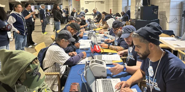 Men registering for PSA screenings at Yankee Stadium